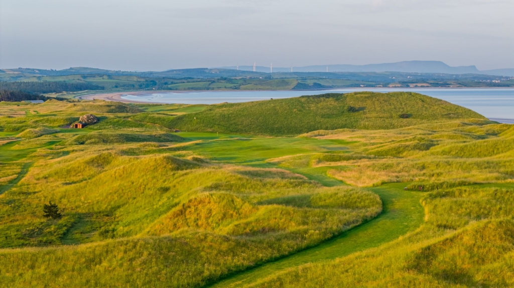 Hole 7 surrounded by links dunes and bunkers with countryside views