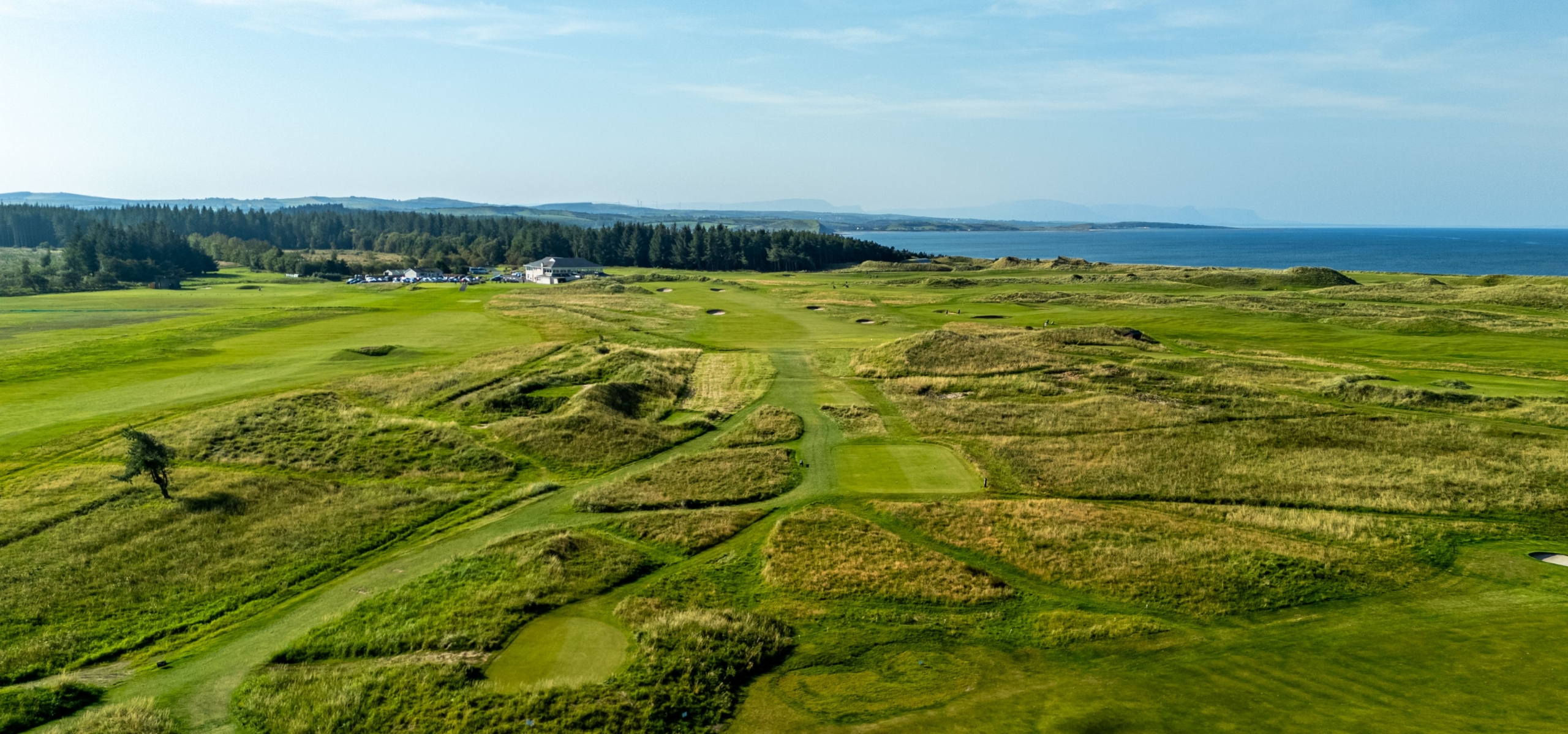 hole 18 of donegal golf course green field against blue sky